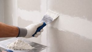 Application de composé sur cloison sèche